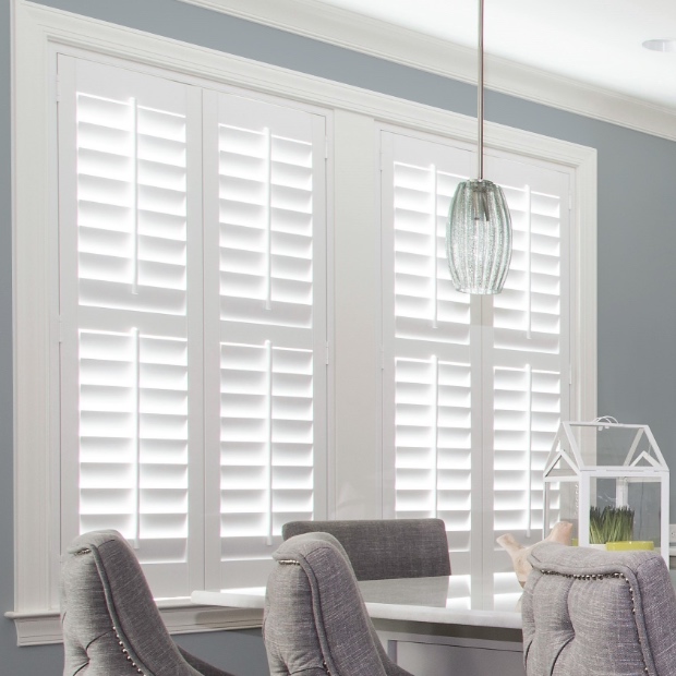 White polywood shutters in dining room