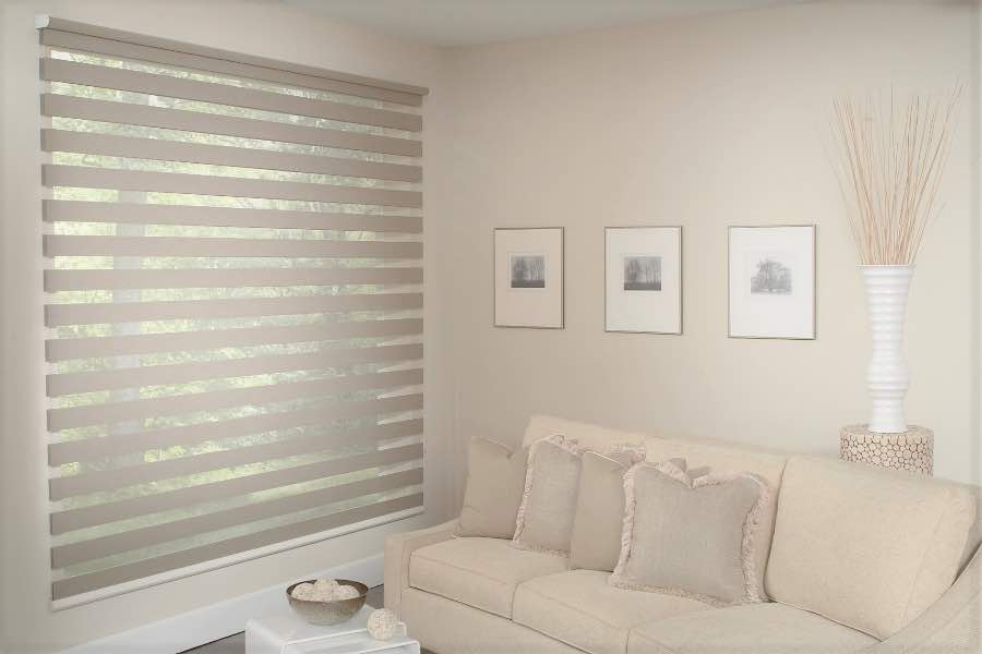 Zebra shades give you a unique combination of light control and style that benefits your Atlanta home. Zebra shade allows filtered light into a living room
