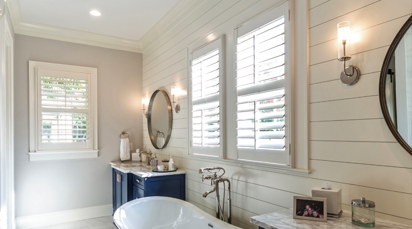 Atlanta bathroom with white plantation shutters.