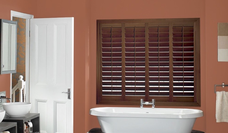 Put spare paint to excellent use and give your living space a fresh look. Plantation window treatments in a bathroom