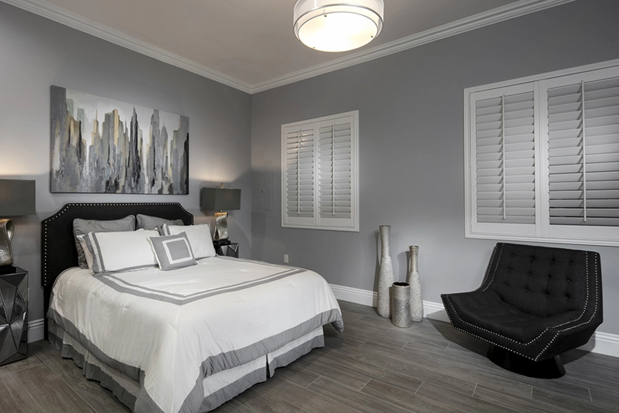 Close your custom Polywood shutters to beat the heat and keep your Atlanta bedroom cool. White Polywood shutters on bedroom windows