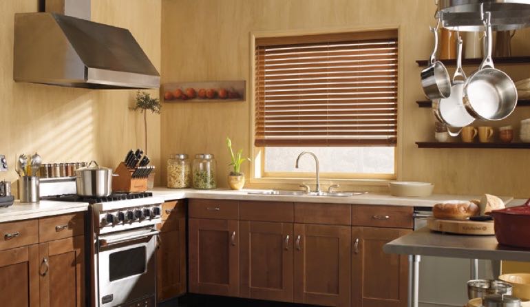 Faux wood blinds look amazing in Atlanta kitchens. Atlanta kitchen faux wood blinds.