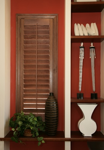 You can even match your wood shutters with shelving. Atlanta wood shutter shelving