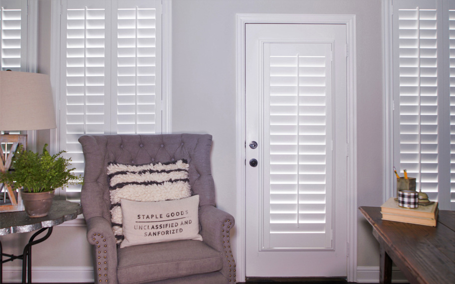 Interior shutters are beautiful and durable window treatments for glass doors in Atlanta. Polywood shutters on a door